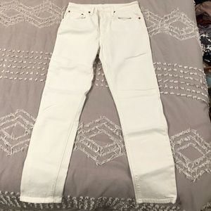 White straight legged jeans- Levi’s 501